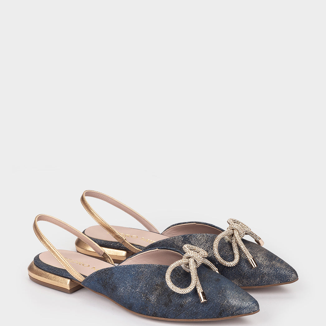 VAQUERO MANCHADO ORO