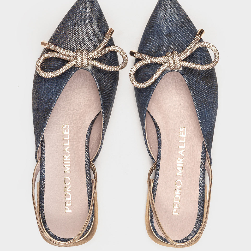 VAQUERO MANCHADO ORO